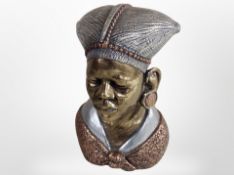 A bronzed and silvered bust of an African woman, height 14cm.