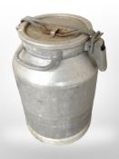 An aluminium milk churn,