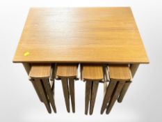 A teak nest of five tables,