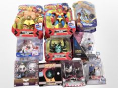 A group of Funko and other figures, including Power Players, Hellboy, Toy Story, etc.