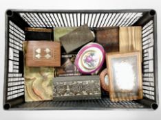 A collection of trinket boxes including carved wooden porcelain and onyx examples.