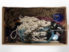 A tray of costume bead necklaces, faux pearls, etc.