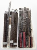 Two boxes containing a large quantity of railway track and passenger cars.