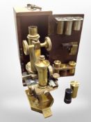 A lacquered brass microscope by R and J Beck Ltd of London, No. 24596, in mahogany box.