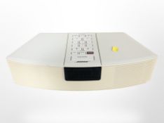 A Bose wave radio model AWR1-2W. CONDITION REPORT: No lead or remote.