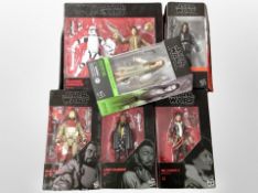 A group of Hasbro Disney Star Wars figures.