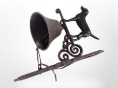 A cast-iron labrador bell on bracket, length from wall 24cm.