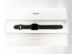 An Apple watch series 3, Space Gray aluminum Black Sport, in box with instructions,