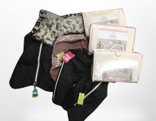 A box of three Primark duvet covers, pyjamas,
