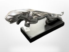 A cast-aluminium Jaguar-style car mascot on plinth, length 31cm.
