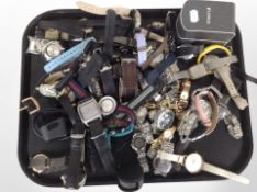 A large quantity of lady's and gent's fashion wristwatches.