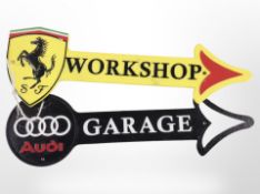 Two cast-iron plaques, Lamborghini and Audi, length 44cm.