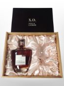 A bottle of Château de Laubade XO armagnac, 70cl, in presentation box with glass.