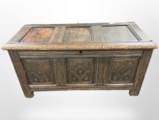 A George III panelled oak coffer,