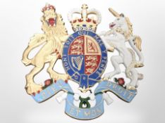 A painted cast-metal royal coat of arms, width 50cm.