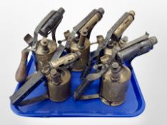 Five vintage brass blow lamps