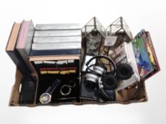 A box containing Sony PSP console, eight wristwatches in box with interchangeable straps,