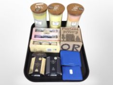 Three Woodwick scented candles, two further packs of Yankee Candles,