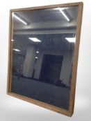 A glazed teak counter top display box with hinged lid,