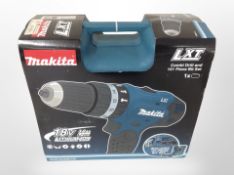 A Makita Combi drill and 101 piece bit set in box