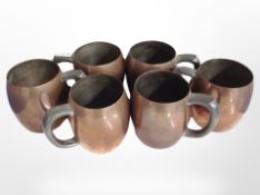A set of six Flemish copper tankards, height 8.5cm.