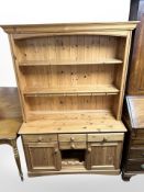 A contemporary pine kitchen dresser,