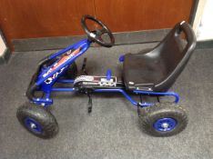 A Team Bopster pedal car