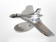 A cast-aluminium bomber, width 40cm.