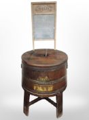 An antique metal-bound butter churn, height 73cm,