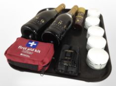 Two bottles of Prosecco, a first aid kit, small pair of binoculars,
