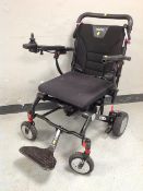 A Pride electric wheelchair CONDITION REPORT: with battery pack - no lead