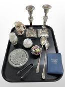 A pair of silver-plated neoclassical candlesticks, height 22cm,