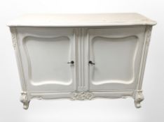 A French style painted double door sideboard,