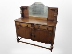 An Edwardian oak mirror backed sideboard,