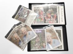 Two folios of commemorative newspapers concerning Elizabeth II.