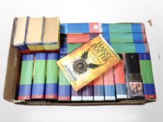 A quantity of Harry Potter books first edition books with dust covers