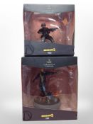Two Weta Workshop Borderlands III figures, Moze and Zane, boxed.