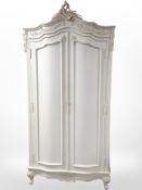 A French style painted double door armoire,