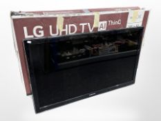 An LG 50 inch LCD TV with in box with lead and remote