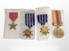 A group of reproduction medals.