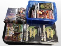 A group of collector's cards including Transformers, Myths and Legends,