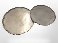 Two graduated oriental engraved brass salvers,