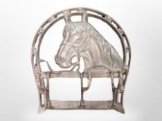 A cast-iron horse coat rack, length 38cm.