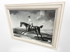 A monochrome print depicting an 18th-century jockey on horseback, 73cm x 52cm.