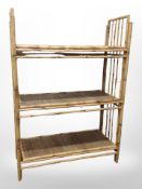 A bamboo open bookshelf,