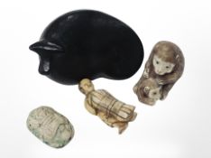 A Japanese cast-iron paperweight in the form of a cow, length 7cm,