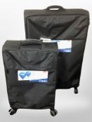 Primark fabric luggage case and one other with tags