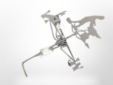 A cast-metal blacksmith weather vane.