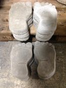Twelve concrete 'feet' garden steps, length 27cm.