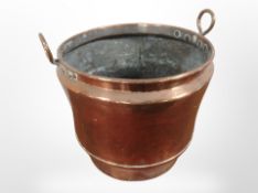A 19th century copper twin handled pot,